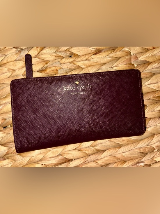 kate spade Handbags - kate spade burgundy saffiano leather zip wallet with gold logo